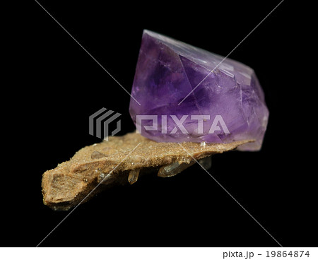 Amethyst crystal isolated on black 19864874