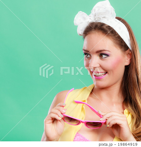 Portrait of happy pin up girl with sunglasses. Portrait of happy pin up girl with sunglasses. 19864919