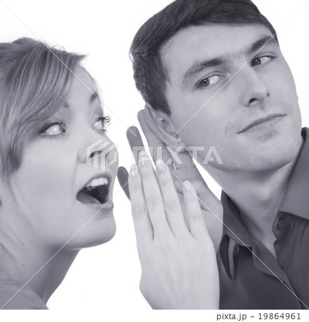 Woman telling man some secrets, couple talking Woman telling man some secrets, couple talking 19864961