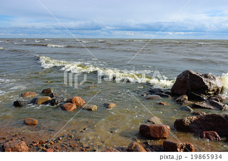 Waves and coastal surf on the sandy beach Waves and coastal surf on the sandy beach 19865934