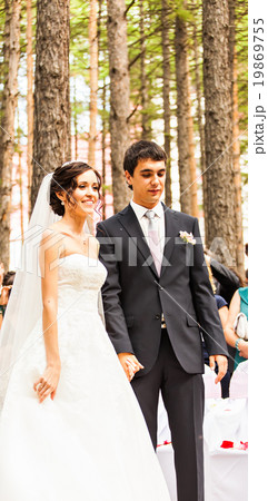 bride and groom on their wedding day 19869755