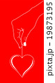 Heart in hand on red 19873195