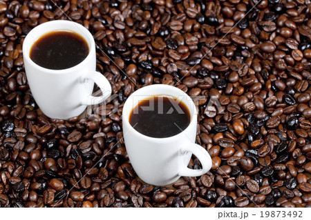still life of coffee cups and coffee beans 19873492