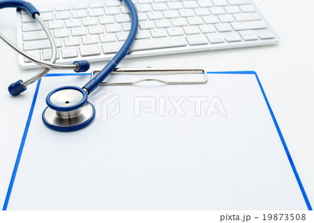 Medical stethoscope on clipboard 19873508
