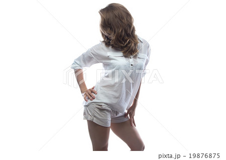 Turned away blond woman in casual shirt 19876875
