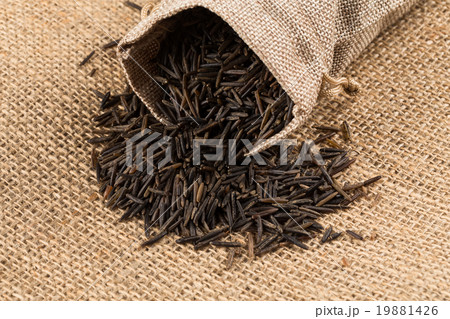 Heap of wild rice on white background Heap of wild rice on white background 19881426