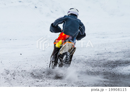 racer motorcycle race in winter 19908115