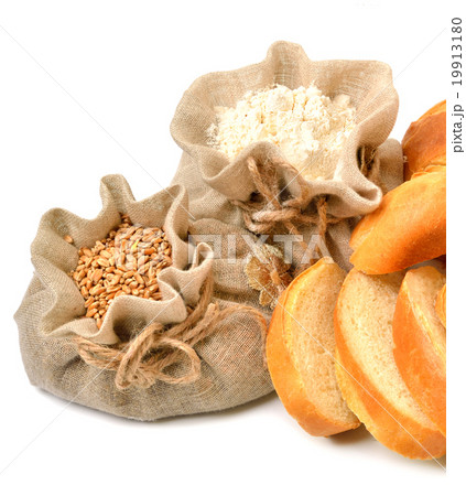 Wheat grains, flour, bread pieces in cloth sacks  19913180