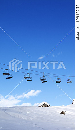 Chair-lift and blue sky at evening 19915252