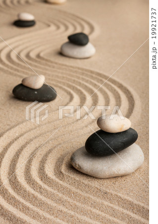 Pyramids made of stones standing on the sand Pyramids made of stones standing on the sand 19921737