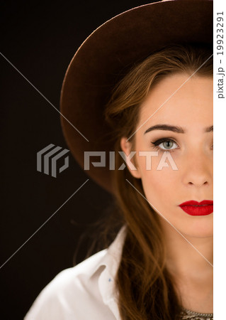 Close-up portrait of lady with red lips Close-up portrait of lady with red lips 19923291