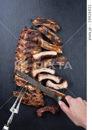 Carving of Spare Ribs Carving of Spare Ribs 19926931