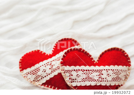 Two felt hearts with laces, symbol of love Two felt hearts with laces, symbol of love 19932072