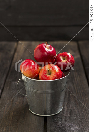 Crop of red apples in metal bucket Crop of red apples in metal bucket 19939847