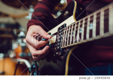 Man playing guitar Man playing guitar 19940840