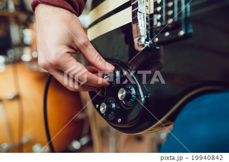 Man playing guitar Man playing guitar 19940842