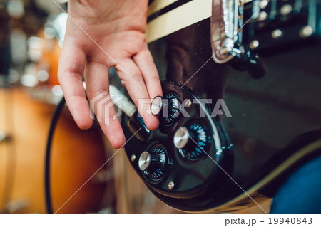 Man playing guitar Man playing guitar 19940843