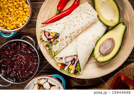 Tortilla with a mix of ingredients Tortilla with a mix of ingredients 19944698