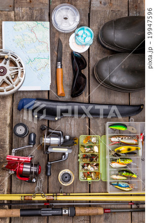 fishing tackles for journey on wooden boards fishing tackles for journey on wooden boards 19947596
