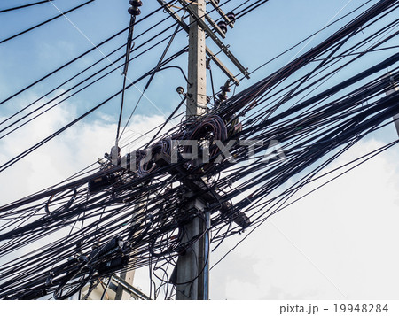 Messy wire on electricity post 19948284