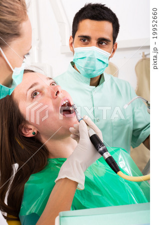 Happy patient and dentist Happy patient and dentist 19952660
