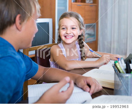 Portrait of children with textbooks and notes Portrait of children with textbooks and notes 19952963