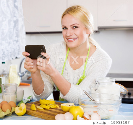 Happy blonde taking photoes 19953197