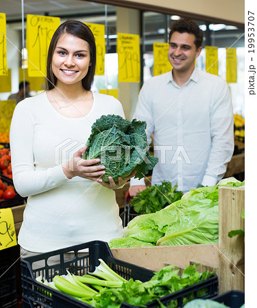 Couple buying vegetables Couple buying vegetables 19953707
