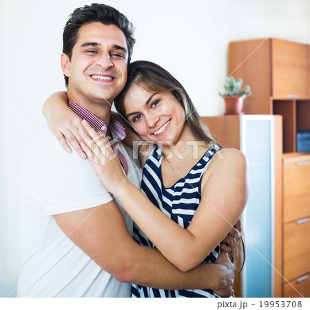 Portrait of happy couple hugging Portrait of happy couple hugging 19953708