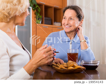Female pensioners drinking tea 19954143