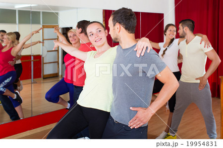 Positive couples dancing Latino dance 19954831