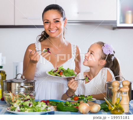 Family of two having healthy lunch with veggies 19955181