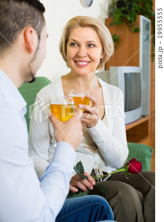 Mature woman with young guy indoors 19955555