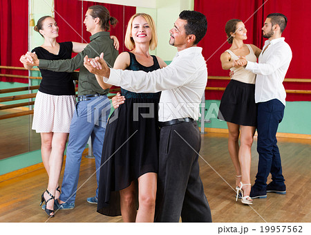 Three happy couples dancing tango Three happy couples dancing tango 19957562