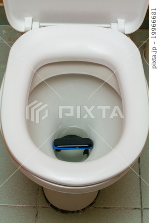 Mobile phone in the toilet 19966681