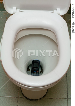 Mobile phone in the toilet 19966684
