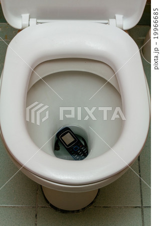 Mobile phone in the toilet 19966685