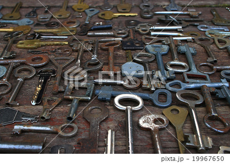 Keys locks wooden background Keys locks wooden background 19967650