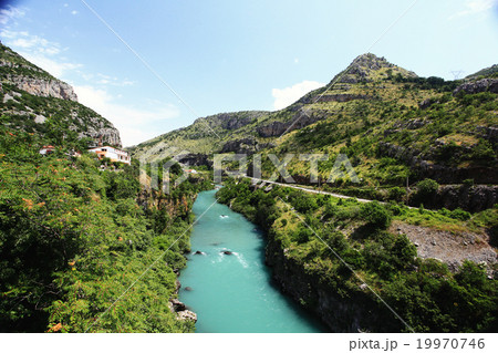 mountain landscape with mountain turbulent river in the gorge mountain landscape with mountain turbulent river in the gorge 19970746