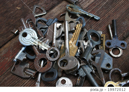 Keys locks wooden background 19972012