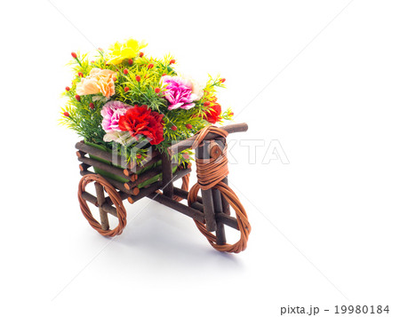 Handmade wooden tricycle toy isolated on white Handmade wooden tricycle toy isolated on white 19980184