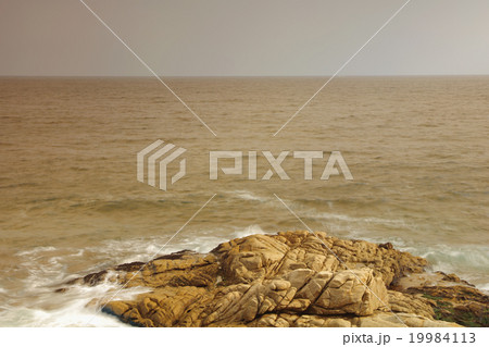 rocky sea coast and blurred water in shek o 19984113