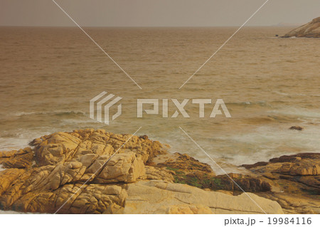 rocky sea coast and blurred water in shek o, 19984116