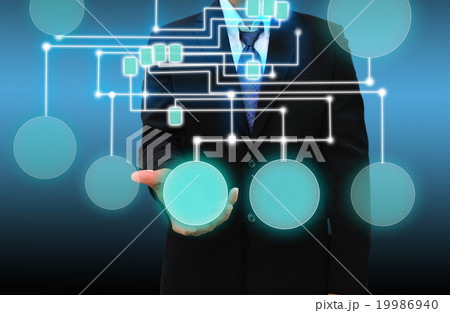 businessman holding a touch screen interface 19986940