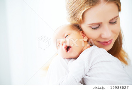 newborn baby in tender embrace of mother newborn baby in tender embrace of mother 19988627