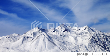 Panoramic view on winter snowy mountains Panoramic view on winter snowy mountains 19990181