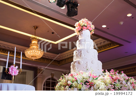 Beautiful cake and candles for wedding party 19994172