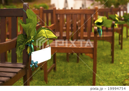 Name plate for guests on the chair. 19994754