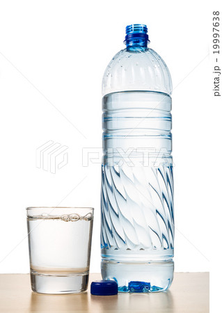 Mineral water in plastic bottle with glass 19997638