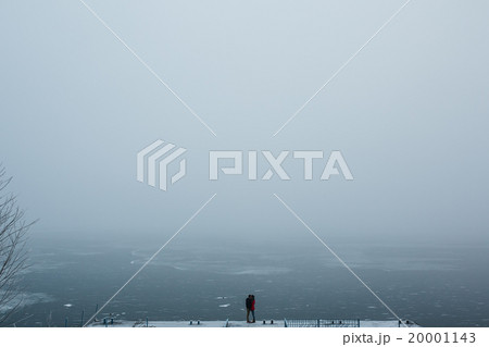 beautiful young couple standing on a pier 20001143